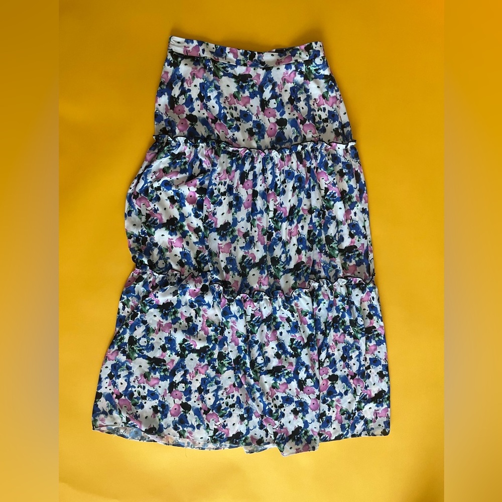 BCBGMaxAzria long skirt. Size small. Floral print. No tags. Perfect condition.